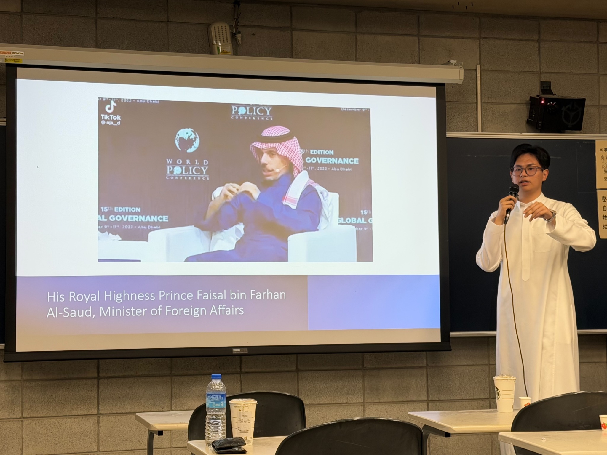Faisal Ma presenting at Shih Chien University: Exploring diplomacy and Saudi foreign-policy perspectives.